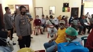 Vaksinasi Covid-19 Tahap II, Di Berikan Kepada Masyarakat Kecamatan Hinai Bertempatan Di Polsek Hinai