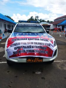 Dukung Program Bantuan Beras Pemerintah RI, Satlantas Polres Kotamobagu Ikut Salurkan Bantuan Beras Ke Warga Terdampak Covid-19