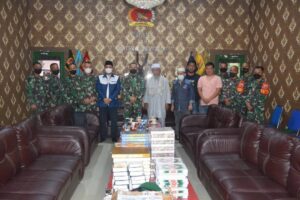 Danyonif 123/RW Terima Bantuan Wakaf Al-Qur’an Dan Alkitab Untuk Masyarakat Perbatasan RI-PNG