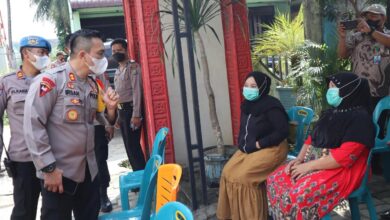 Photo of Kapolresta AKBP Irsan Sinuhaji Monitoring Pelaksanaan Vaksinasi Covid-19 di Desa Bangun Sari Kecamatan Tamora