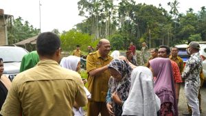 Hari Jadi ke-15 Tahun, Warga Kutambaru Sepakat Dukung Syah Afandin